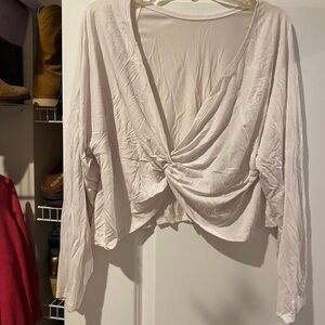 Ladies workout top…criss crosses in the back.